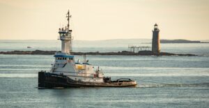 boat motoring in a bay